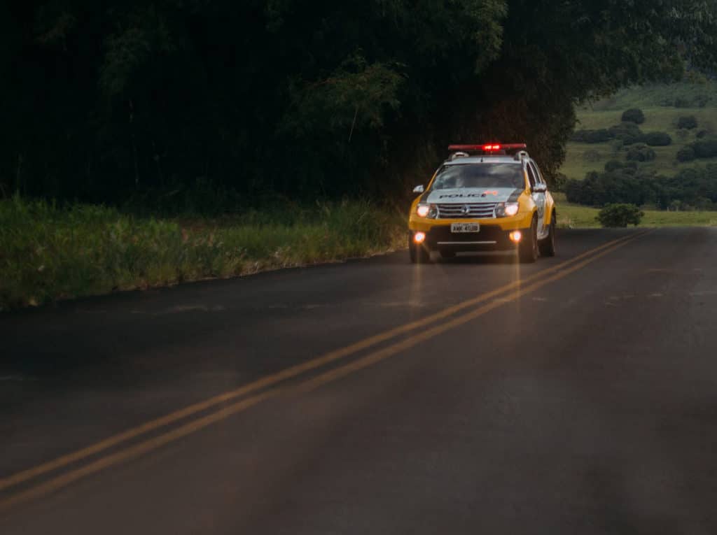 Police car on old road