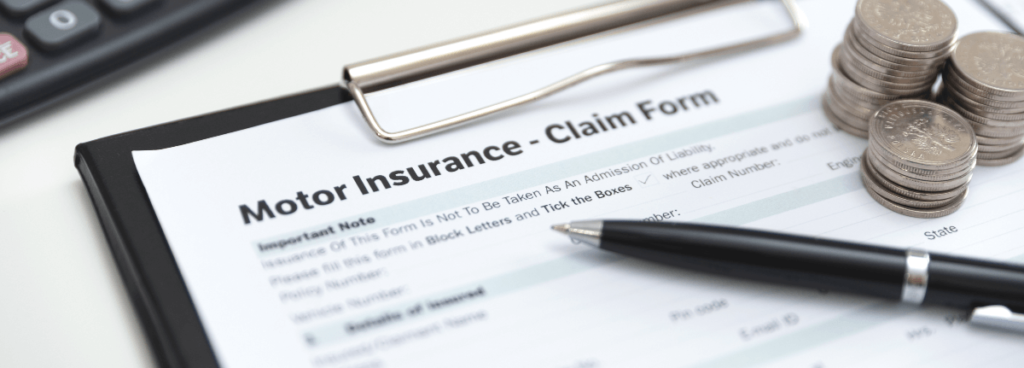 car insurance claim on clipboard
