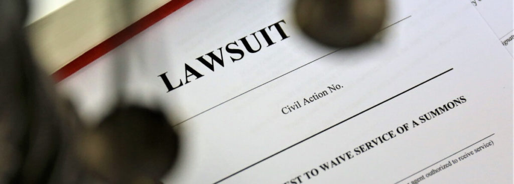 lawsuit documents on desk