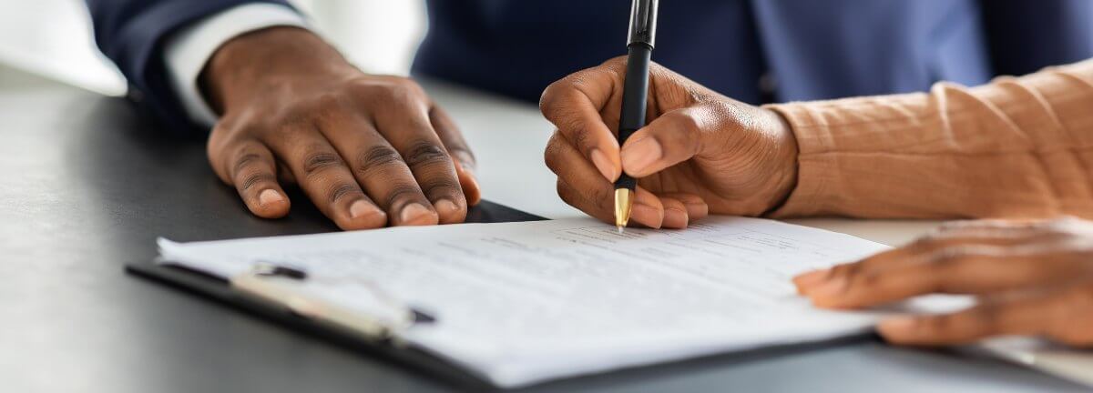 writing on documents on table