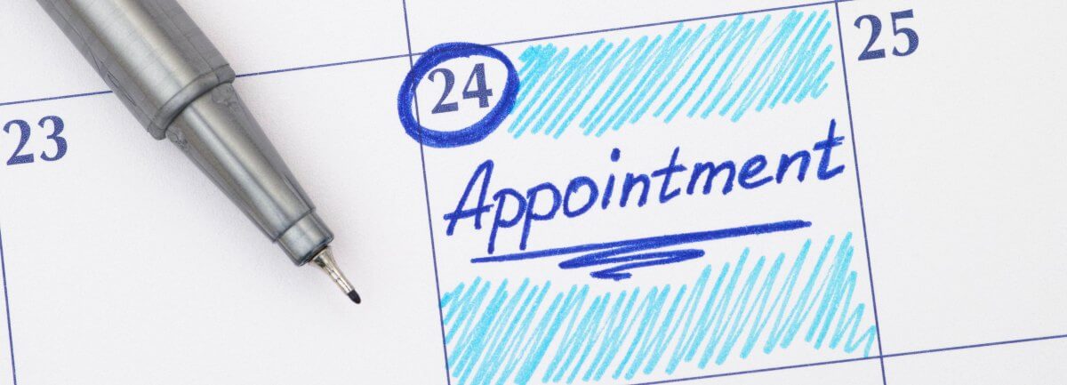appointment marked on paper calendar
