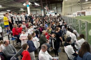 full stands watching soccer game