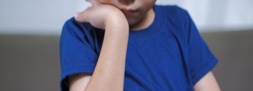 A boy with an injured arm.